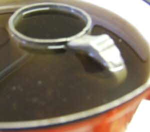 Photo of mug in pan of water usually put the lid on and keep it more to the centre of the pan.