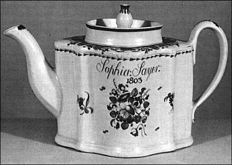 A New Hall porcelain teapot, of typical form bearing the date 1803. 6 inches High. In the Victoria & Albert Museum (Crown copyright)