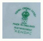 1921-1965 Showing Royal Crown Derby above Crown above interlinked D's with MADE IN ENGLAND below in blue. This mark with pattern name KENDAL and design Registration Number for 1909-1910.